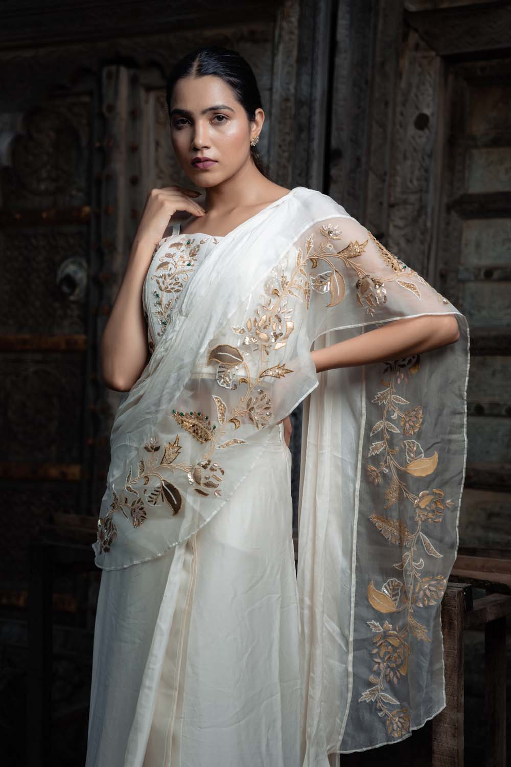 Najakatc- Off White Sleeveless Blouse with  Drapped Saree