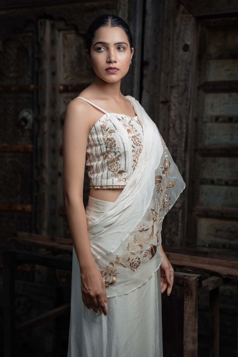 Najakatc- Off White Sleeveless Blouse with  Drapped Saree