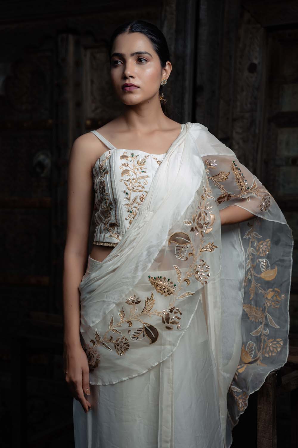 Najakatc- Off White Sleeveless Blouse with  Drapped Saree